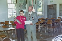  Joan [Gatter] Mumma presenting a $2000 check to Principal Dan Spence