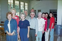  The reunion committee, the principal and Joan's family