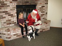  Grace Dausses and Santa admiring 